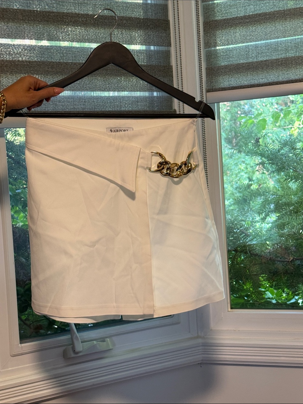 White Mini Skirt with Gold Chain Accent